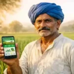 Farmer registering for Pradhan Mantri Fasal Bima Yojana on Crop Insurance App in Rajasthan paddy field, Kharif 2026