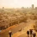 IMD heat wave alert Delhi April 2026 — people walking under harsh noon sun with heat haze rising from roads near Connaught Place